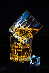 Glacc of cognac with ice and lime
