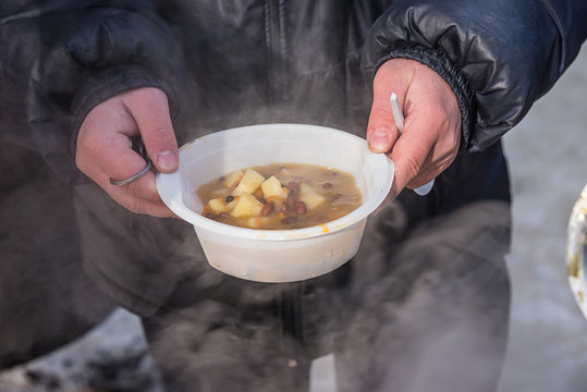 feeding homeless people on the street