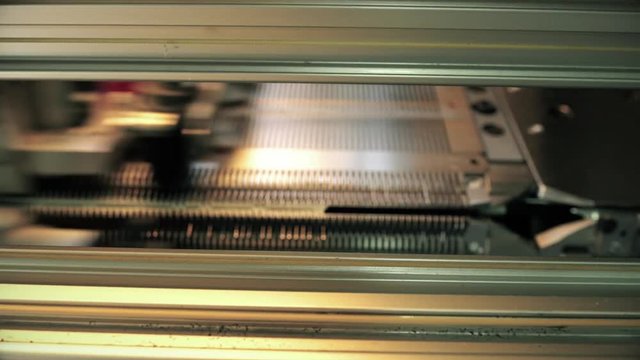 Rewinding equipment working at knitting factory view