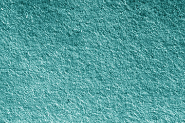 Felt surface in cyan color.