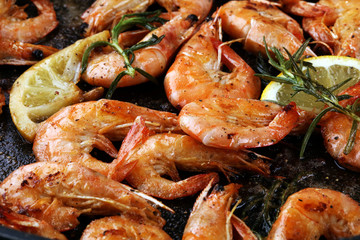 Grilled shrimp skewers. Seafood, shelfish. Shrimps Prawns skewers with herbs, garlic and lemon.