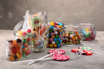 candies with jelly and sugar. colorful array of different childs sweets and treats.