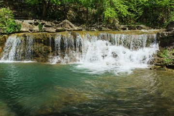 A bubbling stream of pure mountain river Zhane near the village Vozrozhdenie