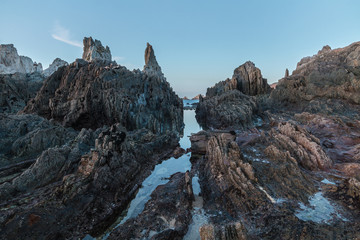 the beach of Gueirua, a disturbing landscape of sharp rocks that emerge from the ocean, pretends to be from another world, with an impressive beauty at dawn, dusk and in the starry night © AGUS