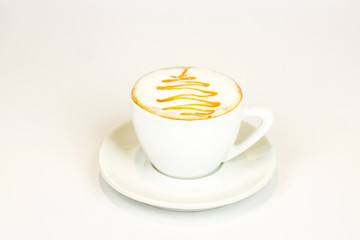 cappuccino with a pattern on a fragrant foam in a white clock