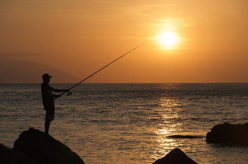 Fototapeta premium Fishing by the sea