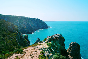 Rocks, sea and vegetation, Cabo da roca cape, Portugal.