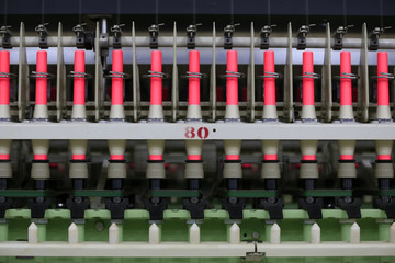The modern spinning machine works in the workshop