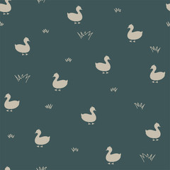 Seamless pattern with birds on a green background. Vector.
