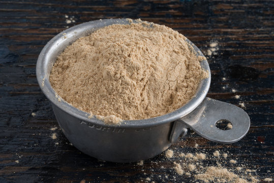 Maca Root Powder in a Measuring Cup
