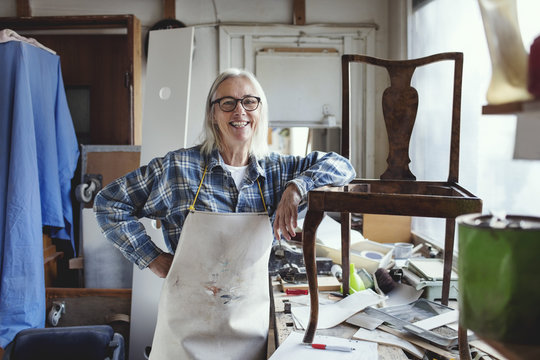 Portrait of upholsterer in her workshop