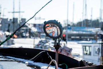Ship signal lamp. Ship lighting on board a floating vessel in the port.