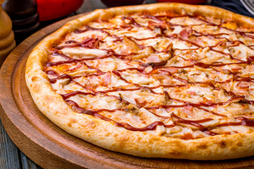 Pizza with meat and barbecue sauce