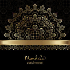 Golden vintage greeting card on a black background. Ethnic mandala pattern. Hand drawn vector illustration