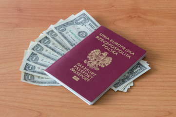 Polish passport with one dollar banknotes.