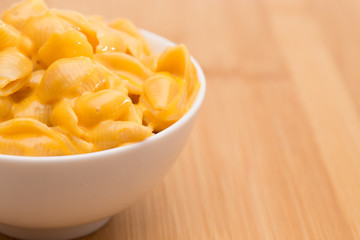Macaroni Shells and Cheese on a Wooden Table