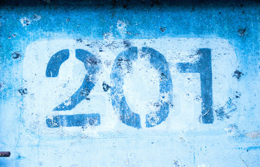 the number 2 0 1 on the blue wall, two hundred and one