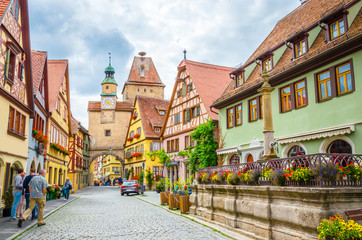 Fototapeta na wymiar Beautiful streets in Rothenburg ob der Tauber with traditional German houses, Bavaria, Germany