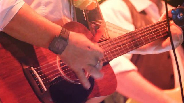 Guitarist playing classic guitar at concert-30 August 2017, Treviso,italy 