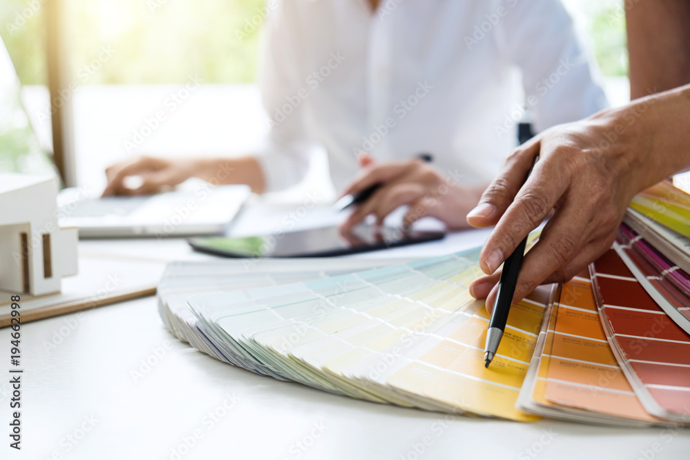 Poster two young women interior design or graphic designer working on project of architecture drawing with 