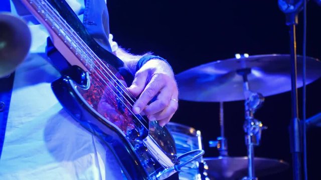 Guitarist playing classic guitar at concert- 30 August 2017, Treviso,italy  - Powered by Adobe