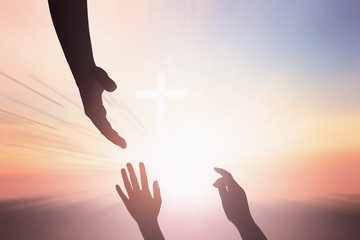 helping hand outstretched for salvation on isolated toned background