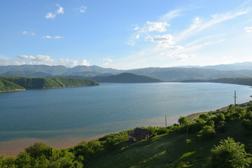 Fototapeta na wymiar Debar Debarsko Lake in Macedonia, with mountains background.