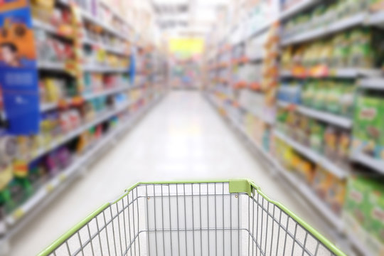 Blur Supermarket With Cart Background In Shopping Mall