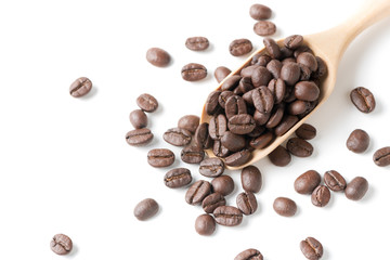 Roasted coffee beans in wood scoop isolated