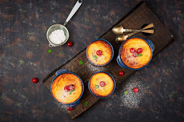 Cottage cheese casserole with cherries. Flat lay. Top view.