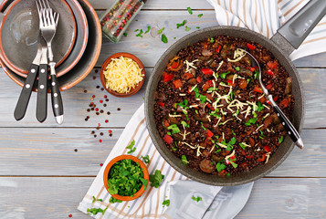 Black lentil beluga with vegetables. Lenten menu. Vegan food. Top view