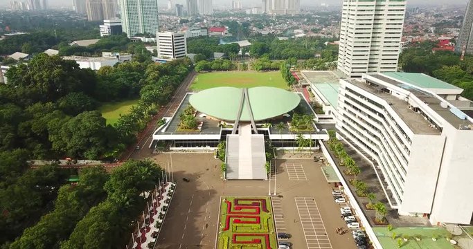 JAKARTA - Indonesia. February 28, 2018: Beautiful aerial view of DPR/MPR Building from a drone flying forward in Jakarta. Shot in 4k resolution