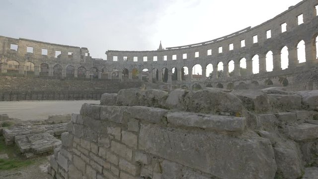 Ancient stone walls at Pula Arena
