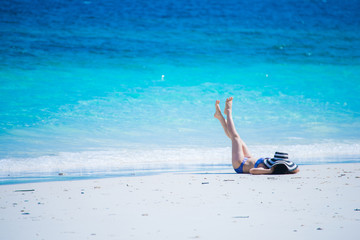 Fototapeta na wymiar Beautiful lady in bikini with hat enjoy summer vacation