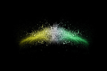 Color Holi powder splattered in Indian festival. Color powder explosion. Flag of India made with colorful powder splash isolated on black background.