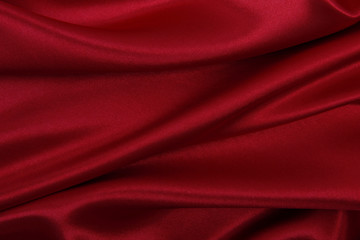 Naklejka na ściany i meble Smooth elegant red silk or satin luxury cloth texture as abstract background. Luxurious background design