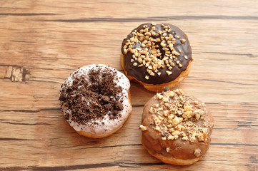Delicious doughnuts covered in various toppings
