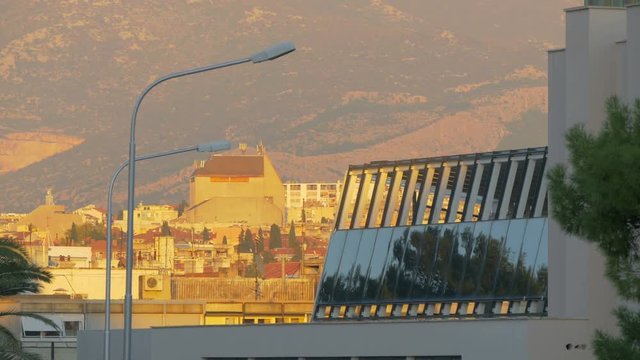 Evening view of lamp posts and buildings