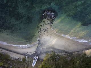 Drone view of a crystal clear beach