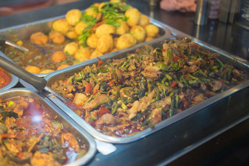 Thai foods style rice and curry at market