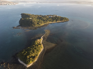 Drone view of 2 small islands cover with trees