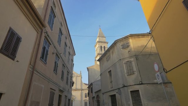 Belfry of St Blaise church seen from a street