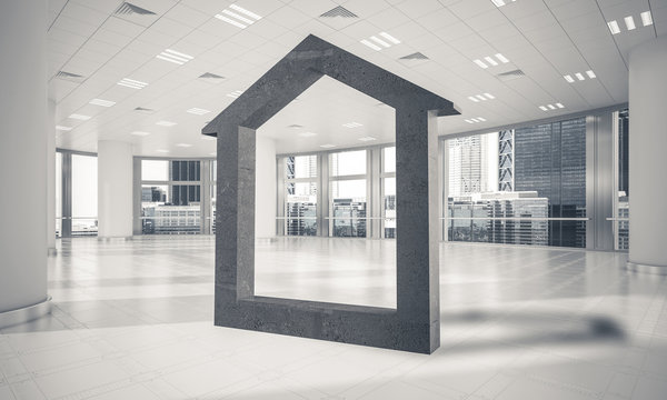 Conceptual background image of concrete home sign in modern offi