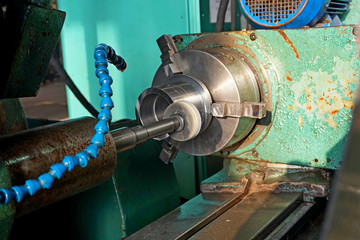 Spindle with an abrasive circle for intra grinding work on the grinder. Dry grinding by a circle end face by a long frame and thin white stone. There grinding inner sleeve hole.