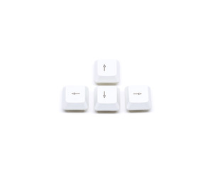 Four white keyboard arrow button isolated on white background