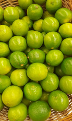 many limes fruit in the basket
