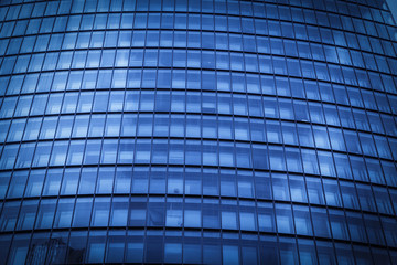 Glass walls of urban skyscrapers