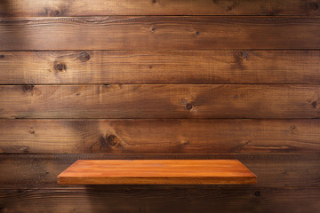 shelf at wooden background wall