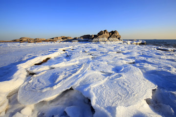 Ice and snow are on the beach