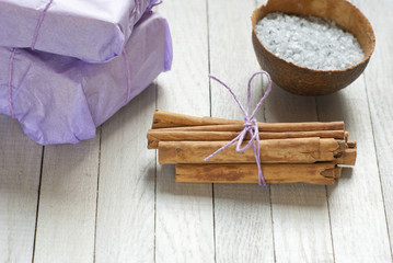 Fototapeta na wymiar cinnamon rolls with gifts, beauty treatment